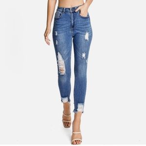 Skinny fit high rise distressed jeans